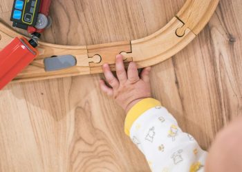 Person in Yellow and White Pajama Pants
